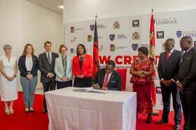 Malawi's President Lazarus Chakwera opens the CREATOR building alongside representatives, including MLW Director Professor Henry Mwandumba and Wellcome chair Julia Gillard