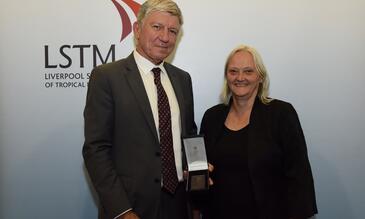 Professor Kevin Marsh receives the Kingsley medal from LSTM Director, Professor Janet Hemingway