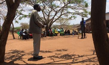 Researcher Hastings Banda explains the project to participating villagers