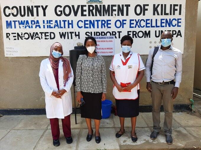 Healthcare workers at a health facility in Kenya during the COVID-19 pandemic with face masks