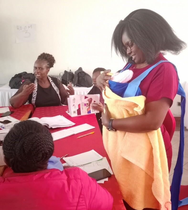 A participant during a return demonstration on Kangaroo Mother Care / photo LSTM