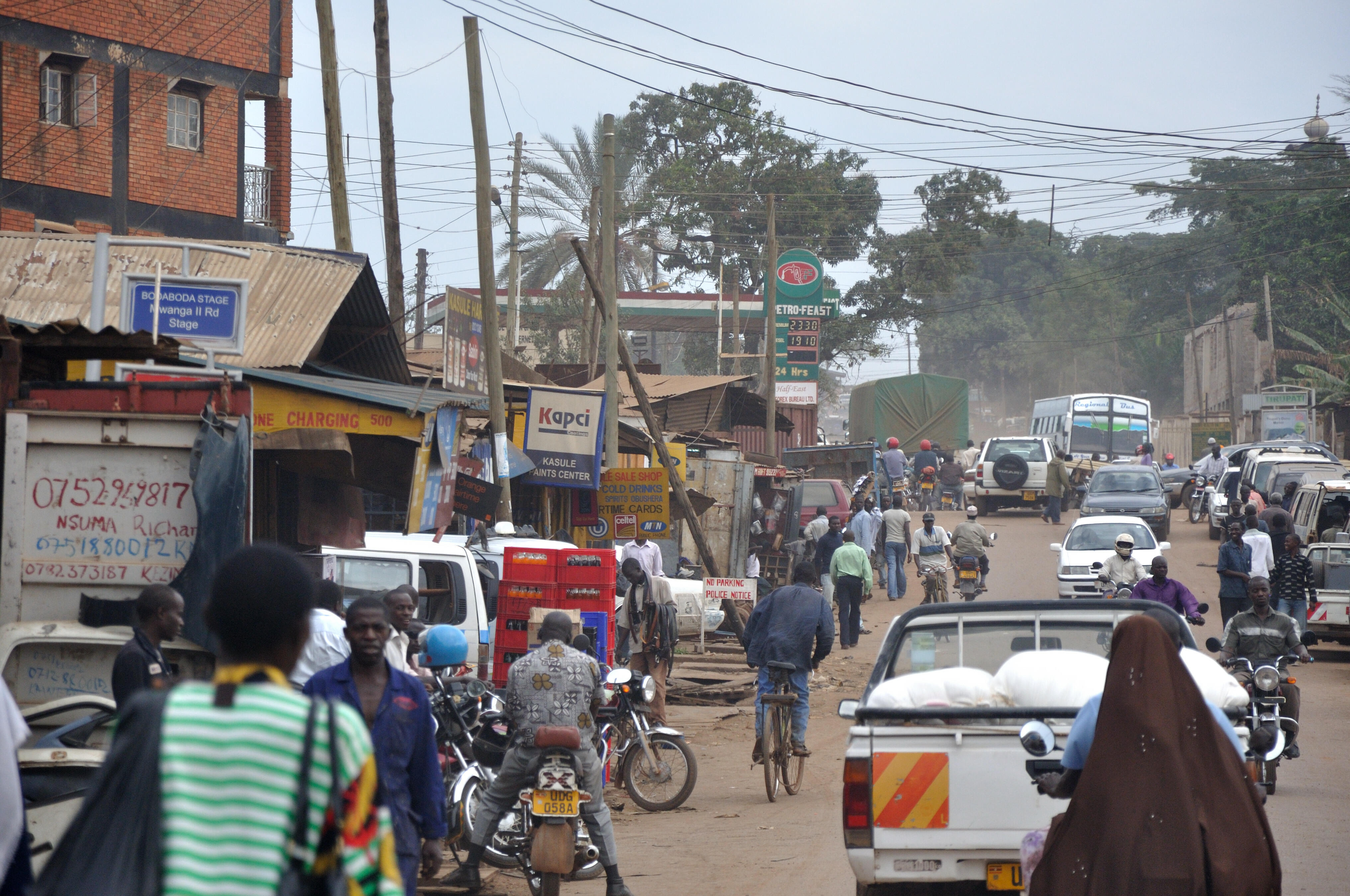 Street views in Kampala. "Kampala 26.08.2009 12-39-51" by Simisa (talk · contribs) - Own work Simisa (talk · contribs). Licensed under CC BY-SA 3.0 via Wikimedia Commons - https://commons.wikimedia.org/wiki/File:Kampala_26.08.2009_12-39-51.jpg#/media/File:Kampala_26.08.2009_12-39-51.jpg