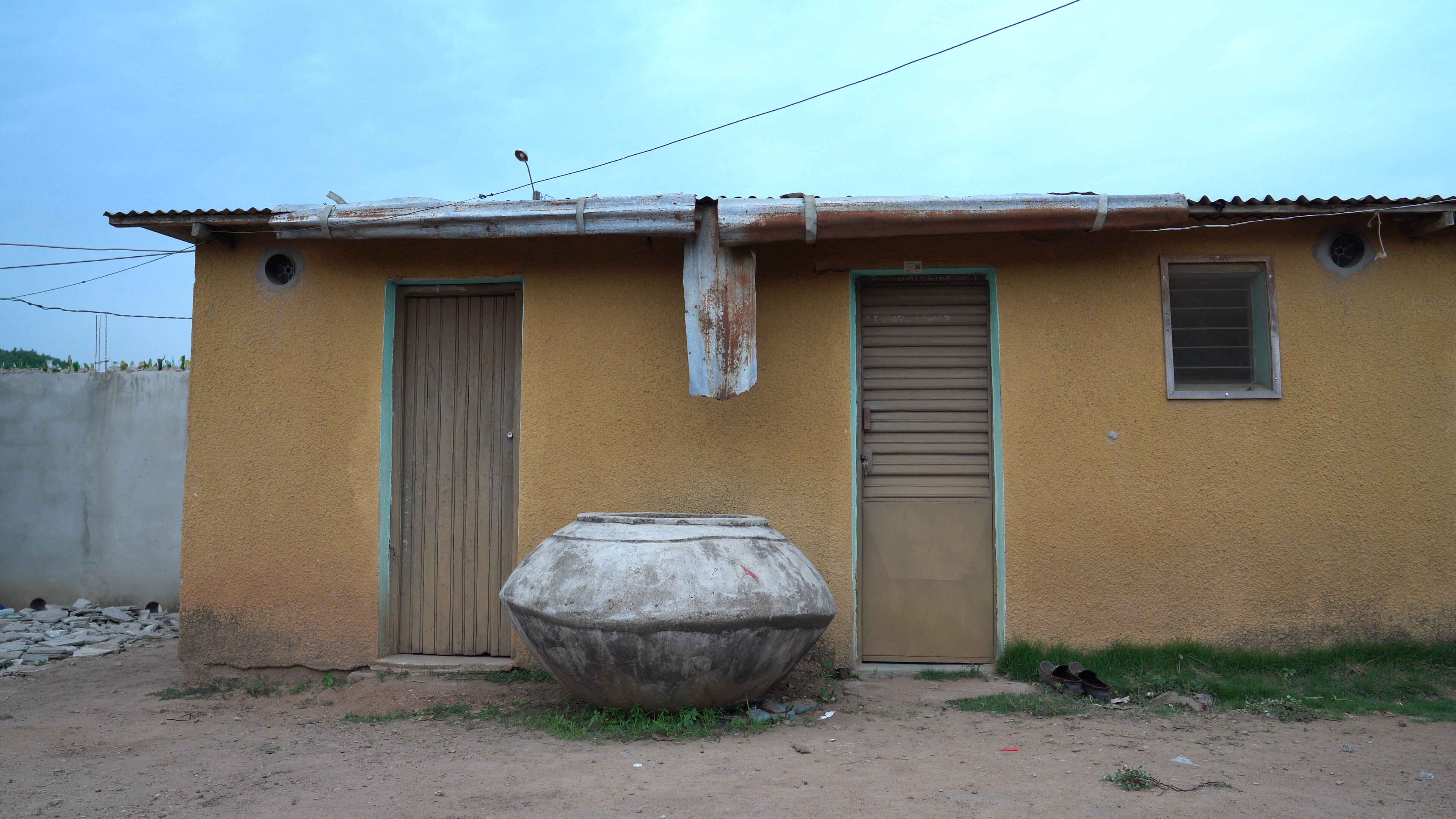 A house in one of the trial villages with screening plus EaveTubes installed. Photo: Daniel Lesher (Penn State University) A house in one of the trial villages with screening plus EaveTubes installed. Photo: Daniel Lesher (Penn State University)