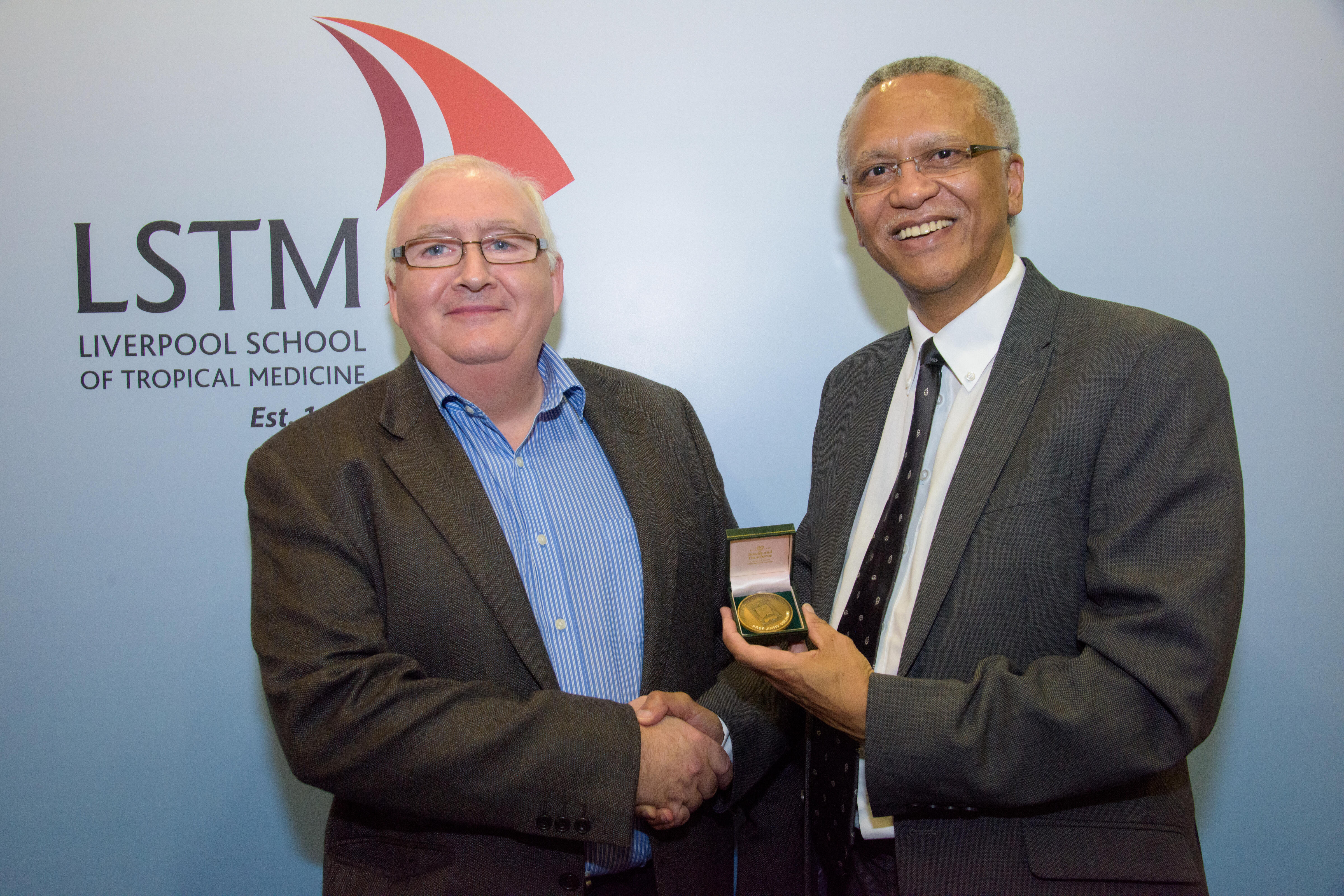 Professor Steve Ward (left) presents the Leverhulme Medal to Professor Jimmy Volmink Professor Steve Ward (left) presents the Leverhulme Medal to Professor Jimmy Volmink