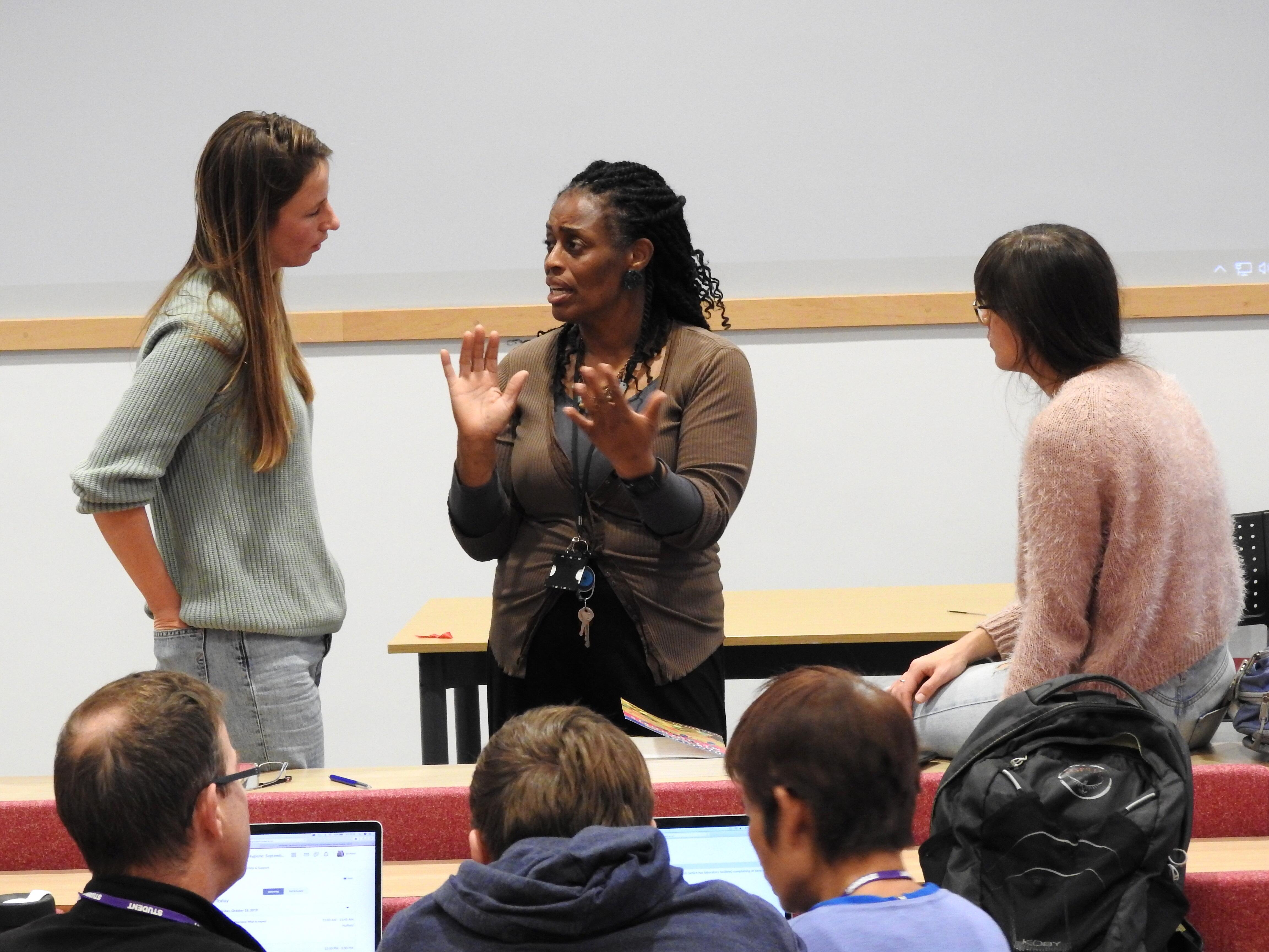 Dr Angela Obasi talking to LSTM students Dr Angela Obasi talking to LSTM students