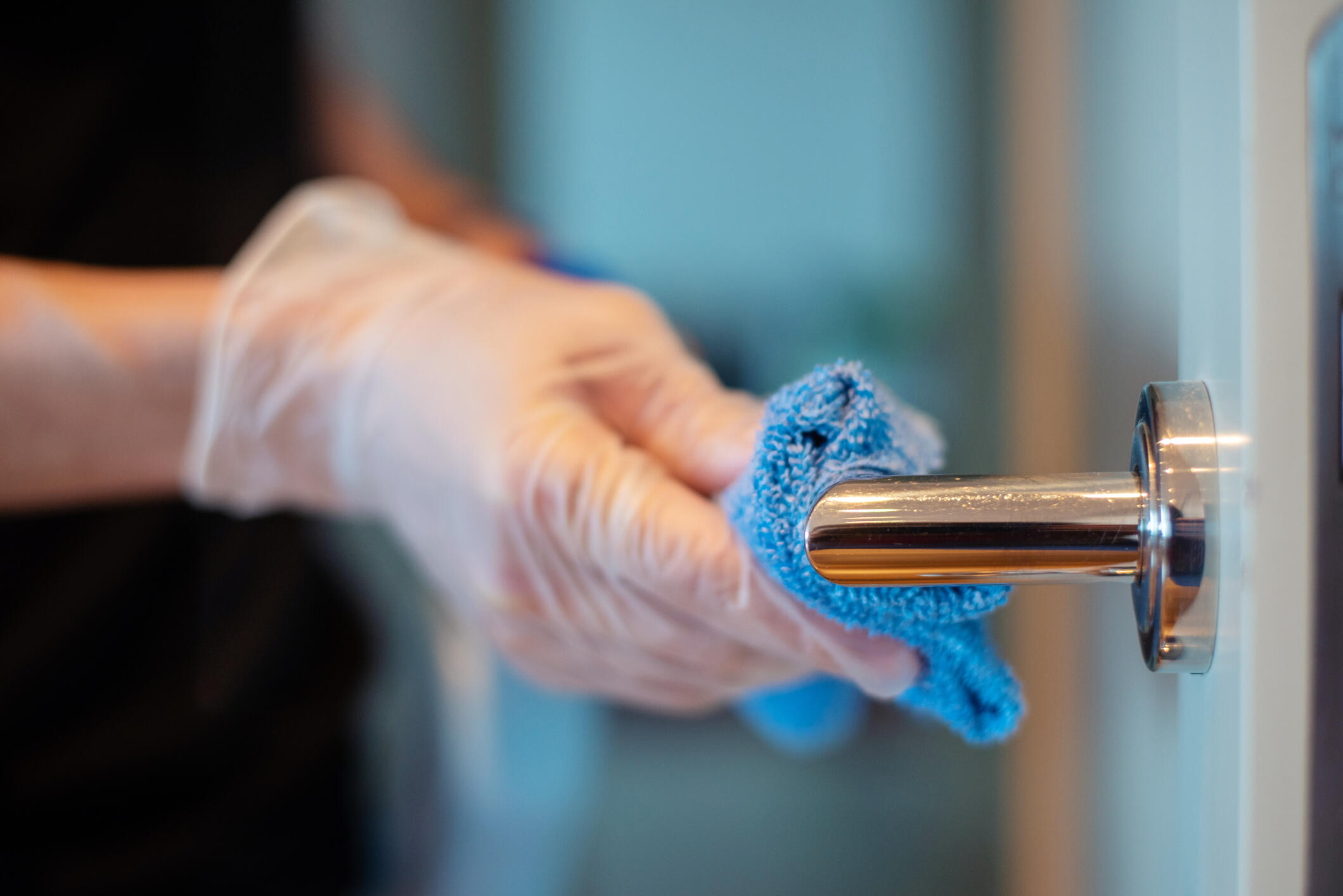 AmDel Medical's products underwent specialist evaluation Door handle being cleaned with disinfectant