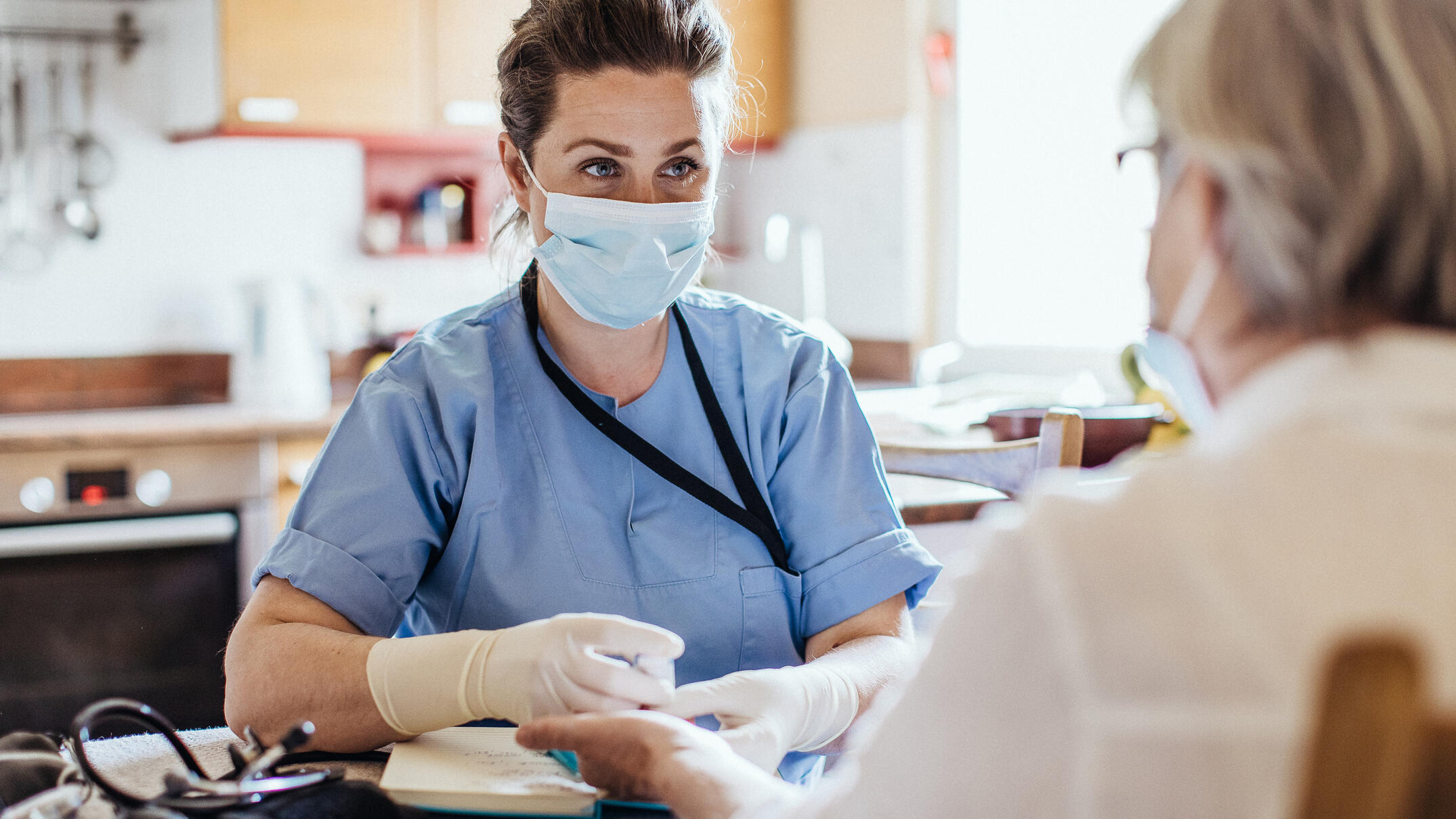 Healthcare worker at home visit Healthcare worker at home visit