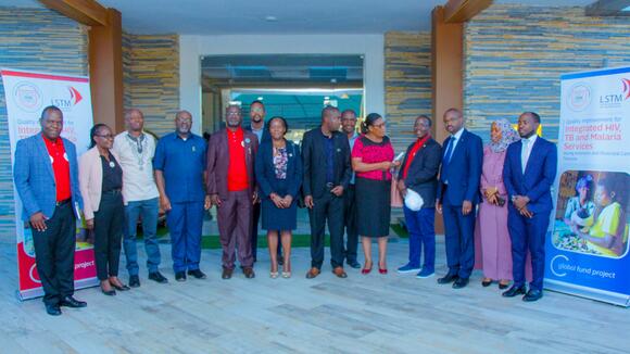 The organizing committee along with the guests at the official launching of the UDOM/LSTM project aiming at Quality Improvement for Integrated HIV, TB, and Malaria services during Antenatal and Postnatal Care, Tanzania
