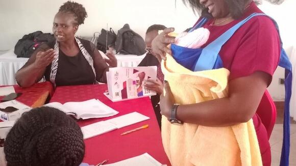 A participant during a return demonstration on Kangaroo Mother Care / photo LSTM