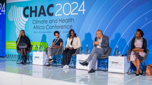 A panel discussion at CHAC 2024