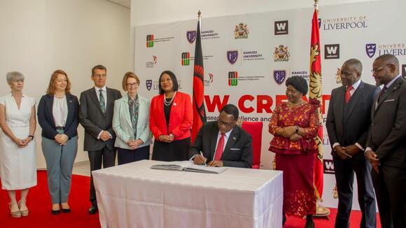 Malawi's President Lazarus Chakwera opens the CREATOR building alongside representatives, including MLW Director Professor Henry Mwandumba and Wellcome chair Julia Gillard